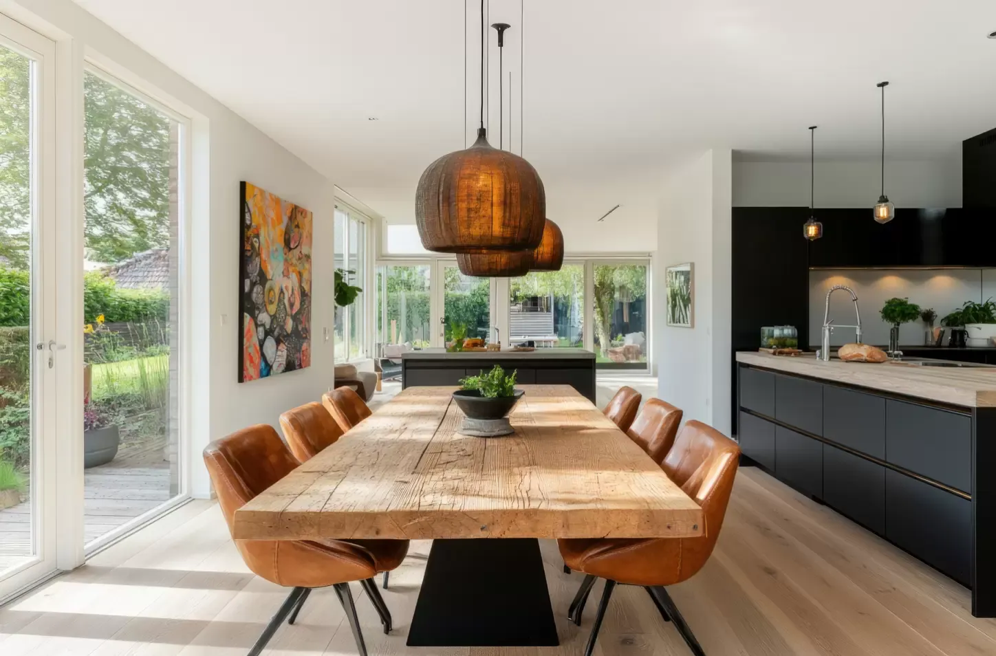 Bright open-plan dining room and kitchen in a modern Colorado home