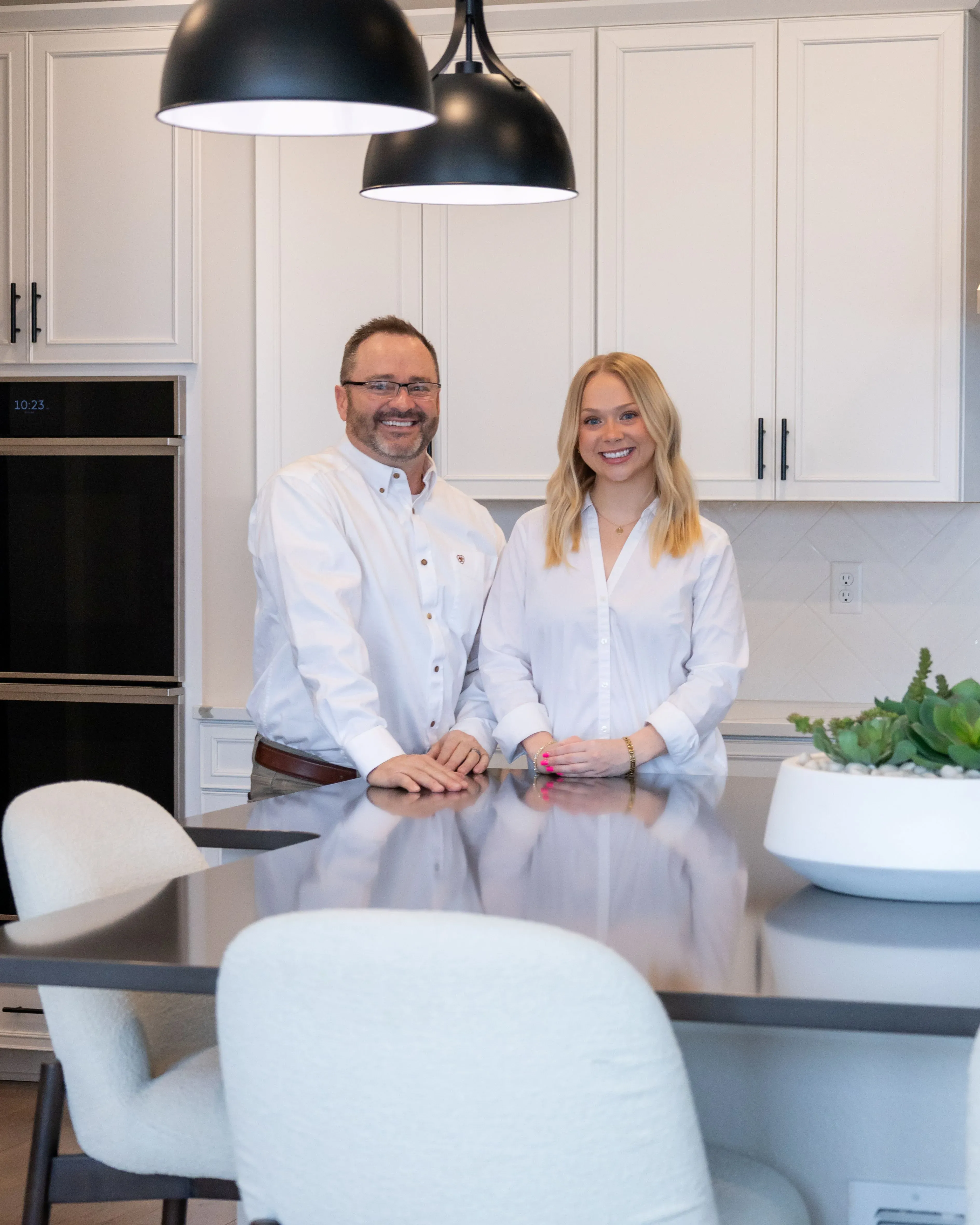 Jeff Spiker and Brooke Spiker in a Denver Metro kitchen — Spiker Realty