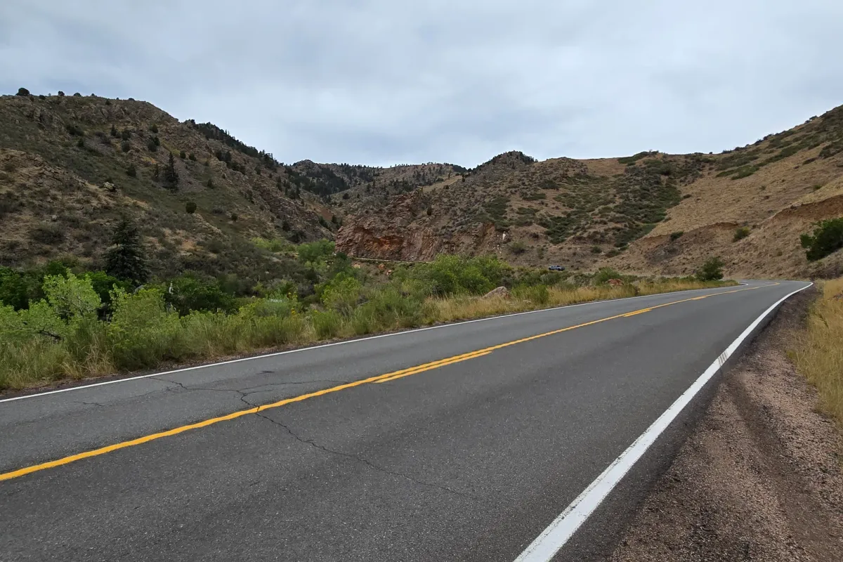 Golden Gate Canyon Road winding through the foothills near Golden, Colorado