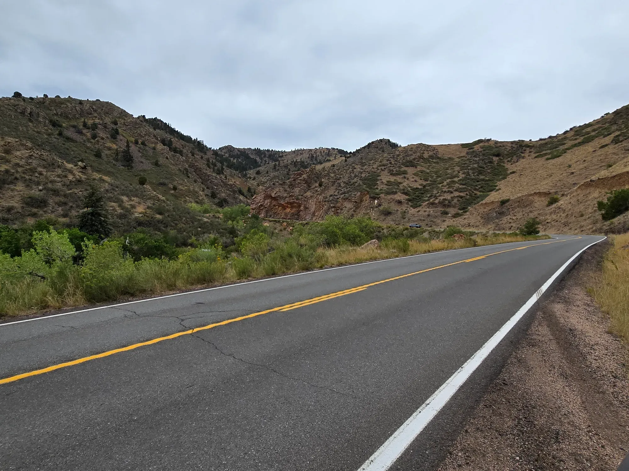 Golden Gate Canyon Road winding through the foothills near Golden, Colorado